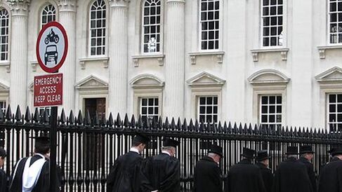 Students walking to Graduation at Senate house